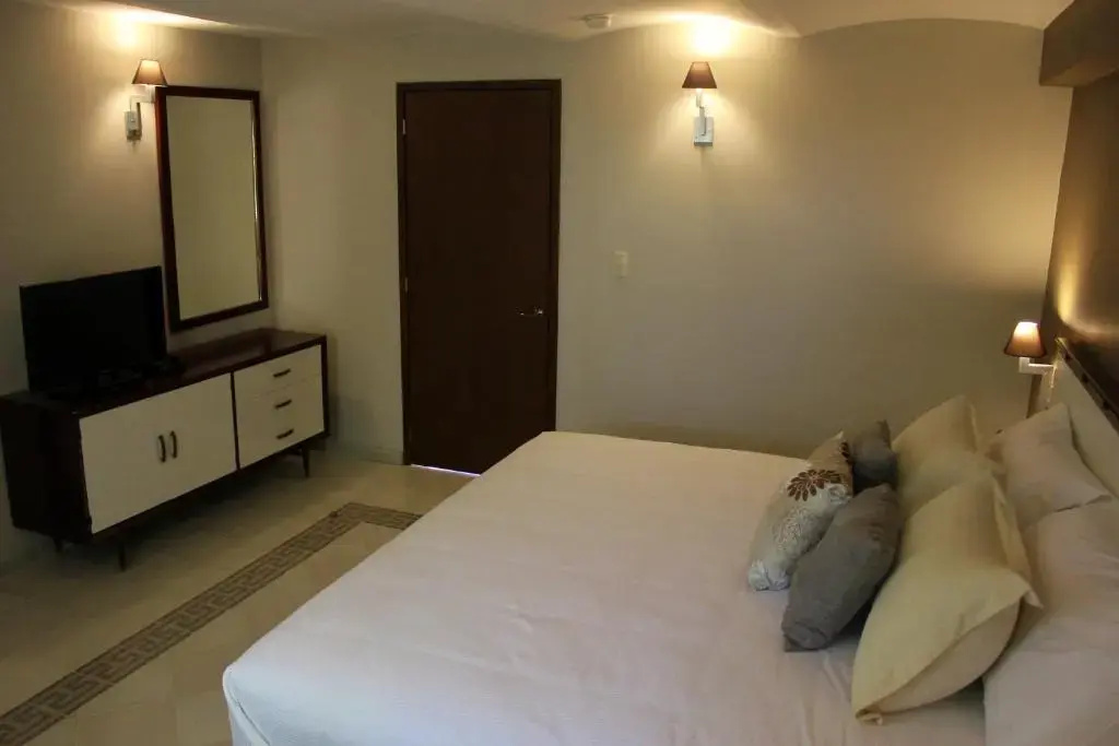 Entre Patios Hotel Boutique - Chambres