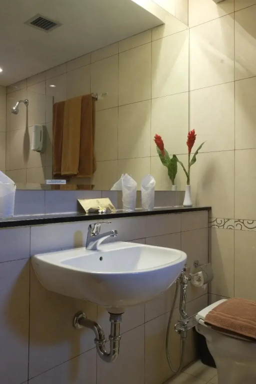 Sukajadi Hotel - Chambres