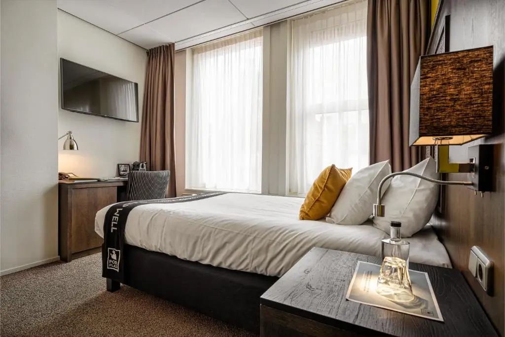 Post-Plaza Hotel & Grand Café - Chambres