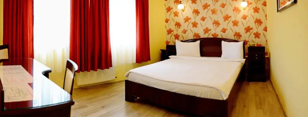 Pensiunea Junior - Chambres