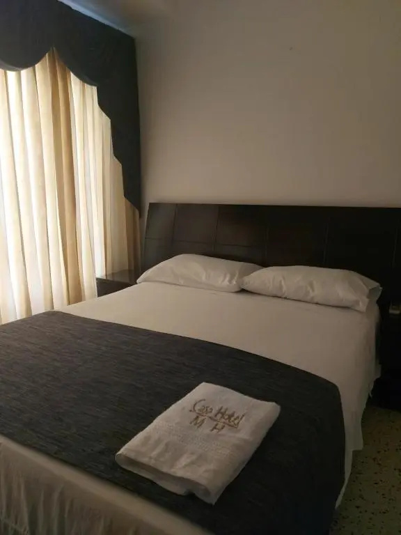 Casa Hotel Miriam - Chambres