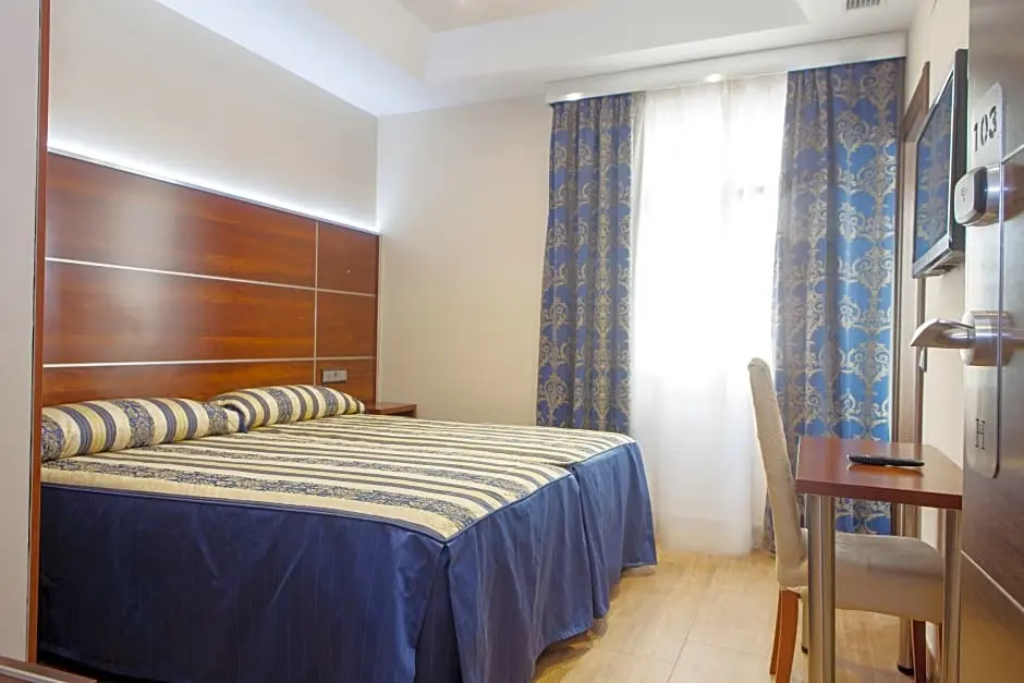 Hotel Castilla Guerrero - Chambres