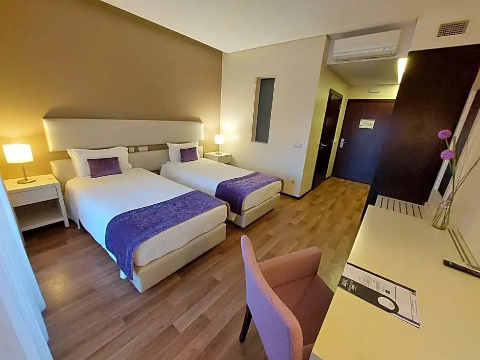 Monte Lírio Hotel - Chambres