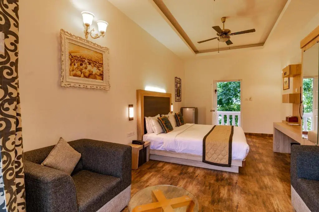 Deluxe room with balcony and with garden view
