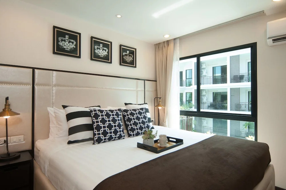 Люкс Comfort c 1 комнатой с балконом и с красивым видом из окна в The Title KR Beach Condotel Rawai Phuket