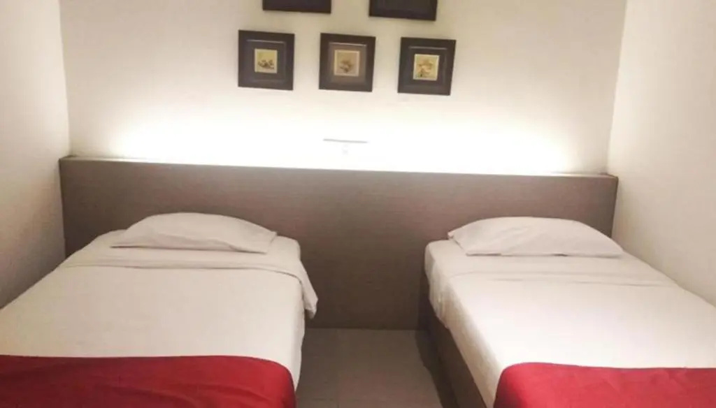 Sukajadi Hotel - Chambres