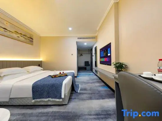 New Land Hotel - Chambres