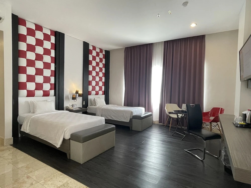 Swiss-Belcourt Makassar - Chambres