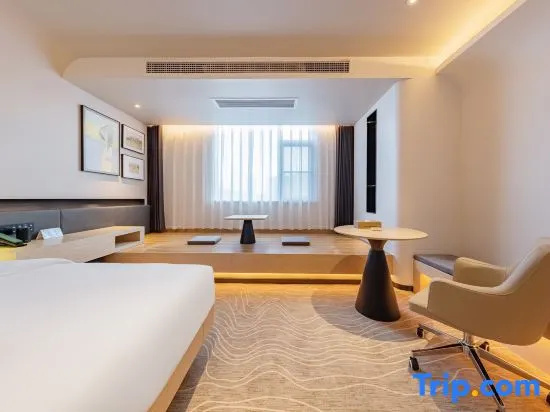 Yihe International Hotel - Chambres