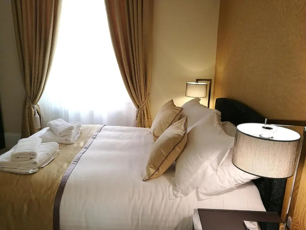 The Devon Court - Chambres