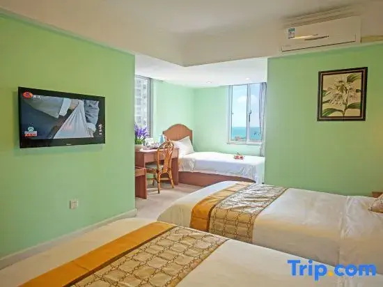 Standard Triple room with garden view