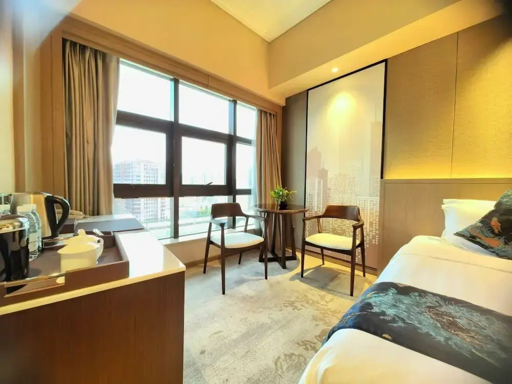 Jin Jiang Pine City Hotel - Chambres