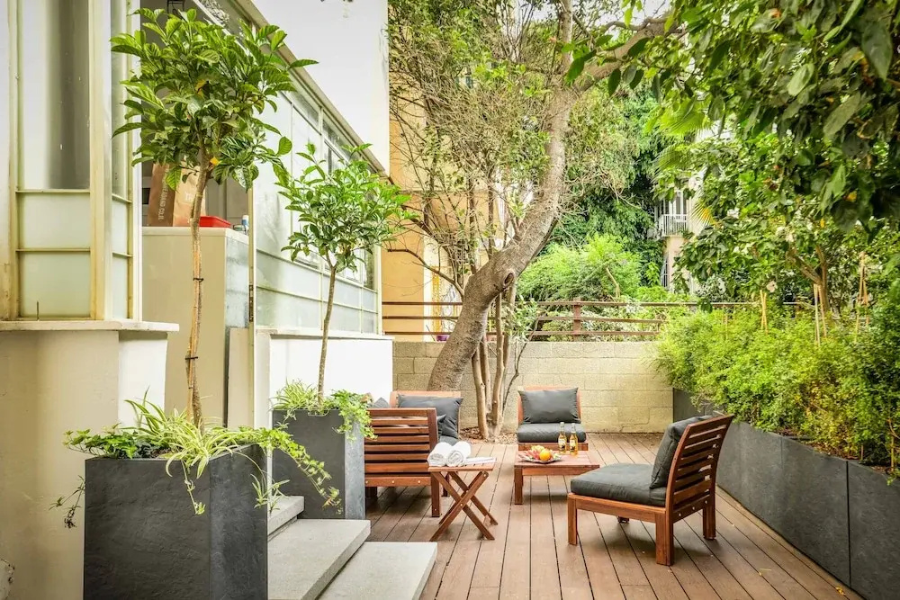Serene Retreat with Lush Garden by Sea N Rent