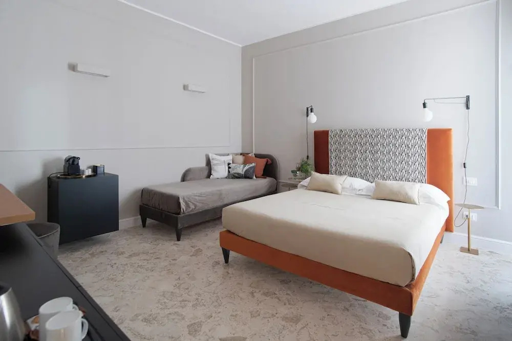 Standard Triple room with balcony and with courtyard view