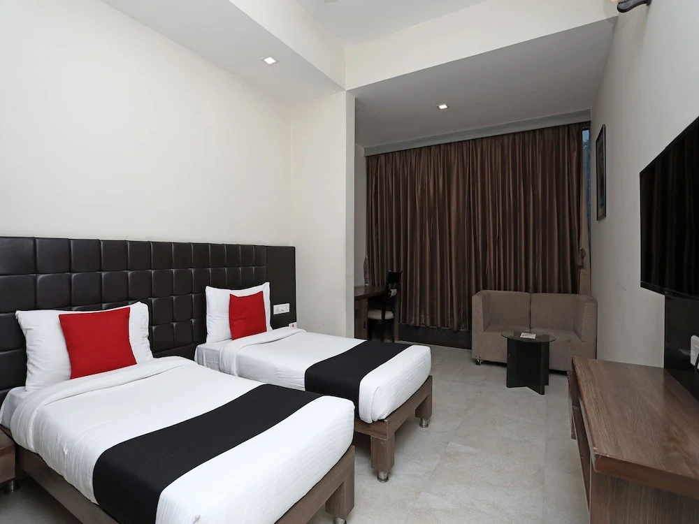 Capital O 3831 Jade Inn - Chambres
