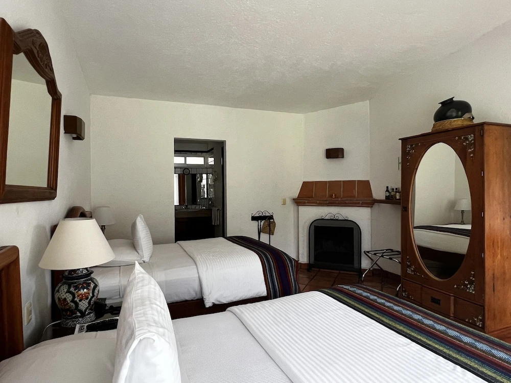 Standard Quadruple room with garden view