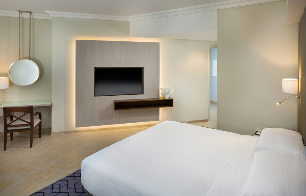 Отель Beach Rotana Hotel - All Suites в Абу-Даби
