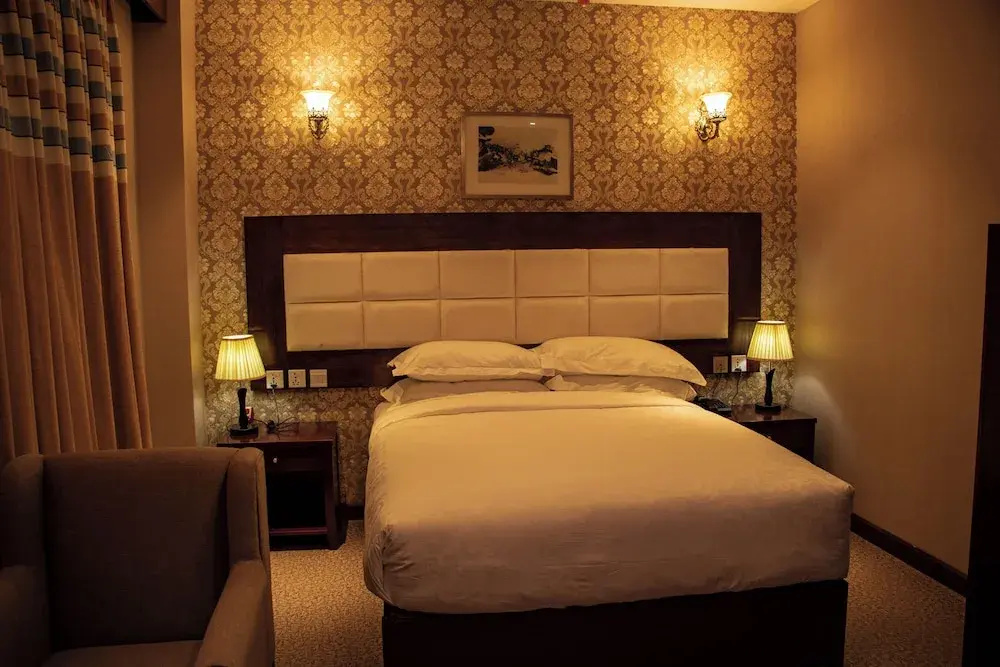 Ratna Hotel - Chambres
