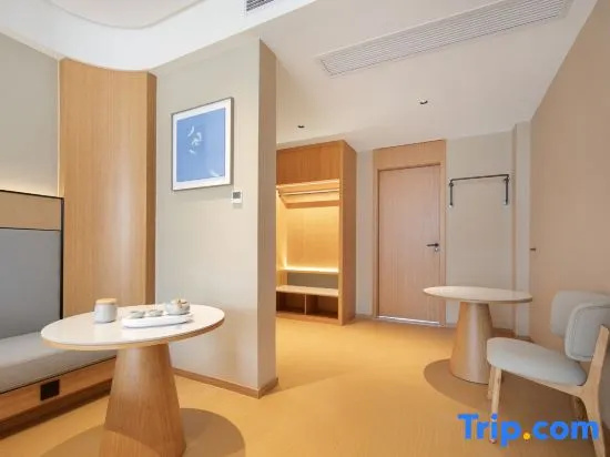 Qingxin Hotel - Chambres