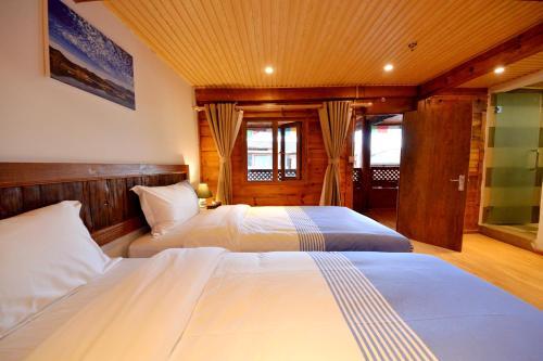 Отель Lugu Lake Guanlanyue Inn, фото 21