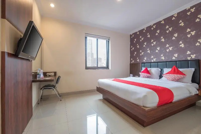 RedDoorz Plus @ Grand Pacifik Hotel Makassar - Chambres