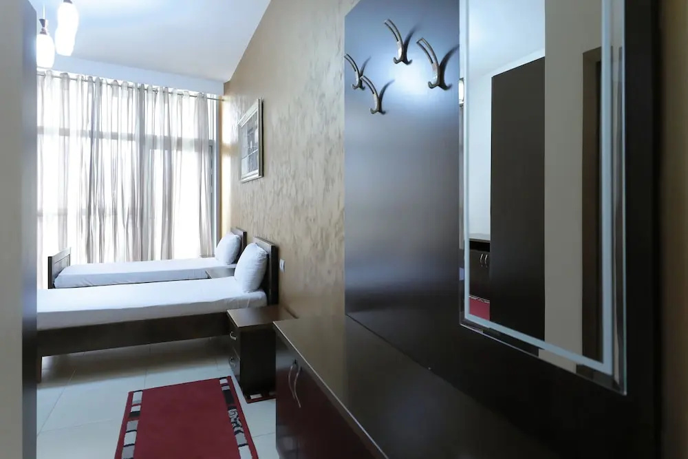 Hotel Gjuta - Chambres