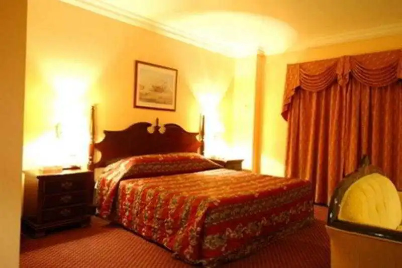 Delmon International Hotel - Chambres
