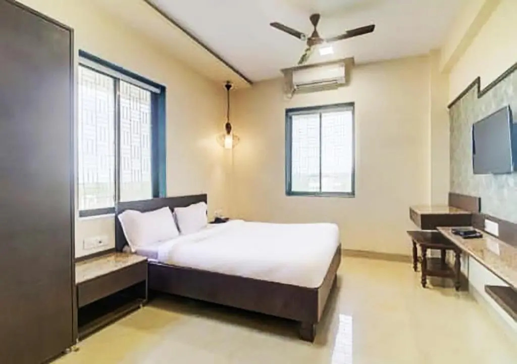 Hotel New Elite Inn - Chambres