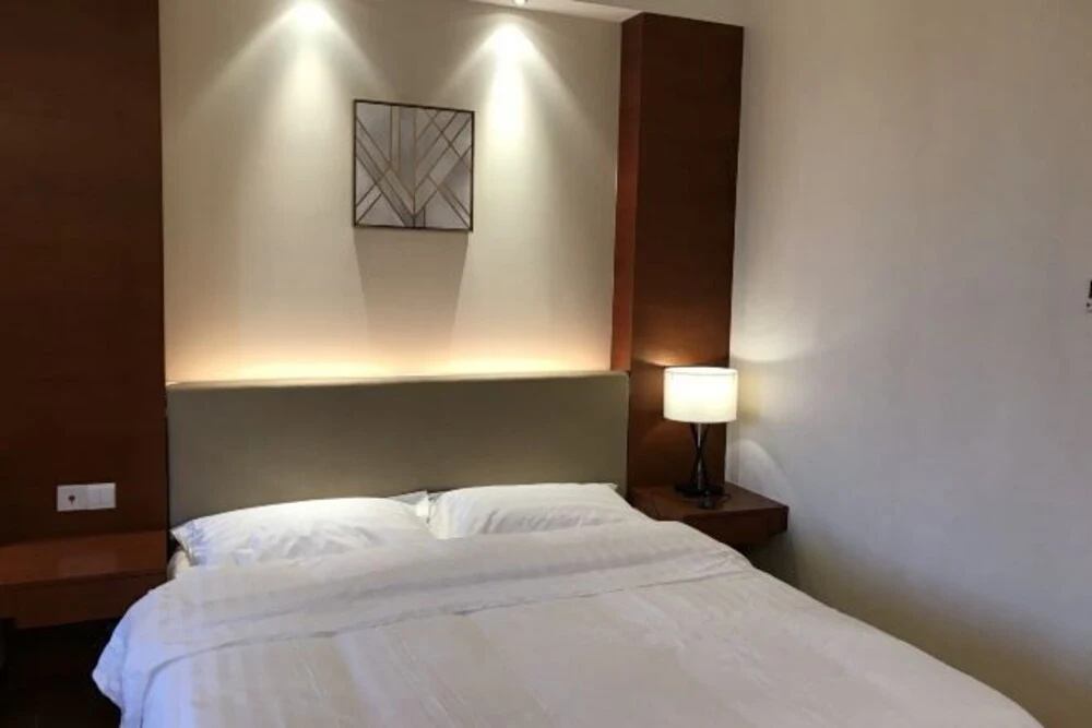 Homey Apartment Hotel