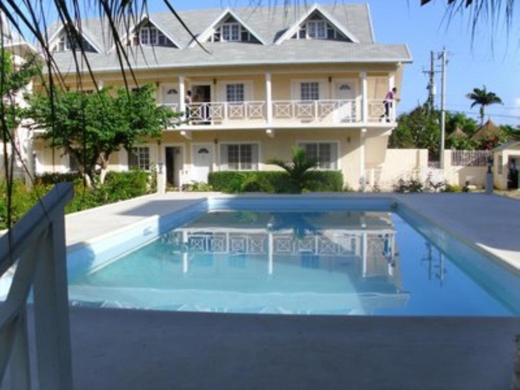 Отель Club Caribbean Court Apartments, фото 9