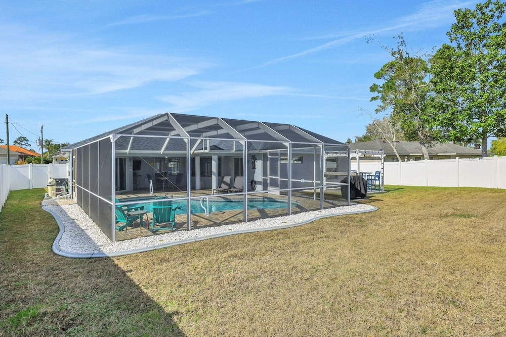 Contemporary Coastal Escape With Heated Pool, Fenced Yard, & Outdoor Dining