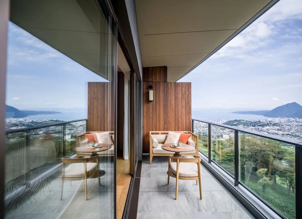 Classic Quadruple Club room with balcony and with city view