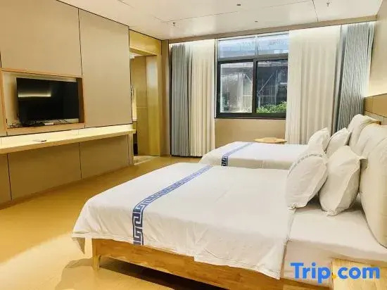 Xishu Sunshine Garden Hotel - Chambres