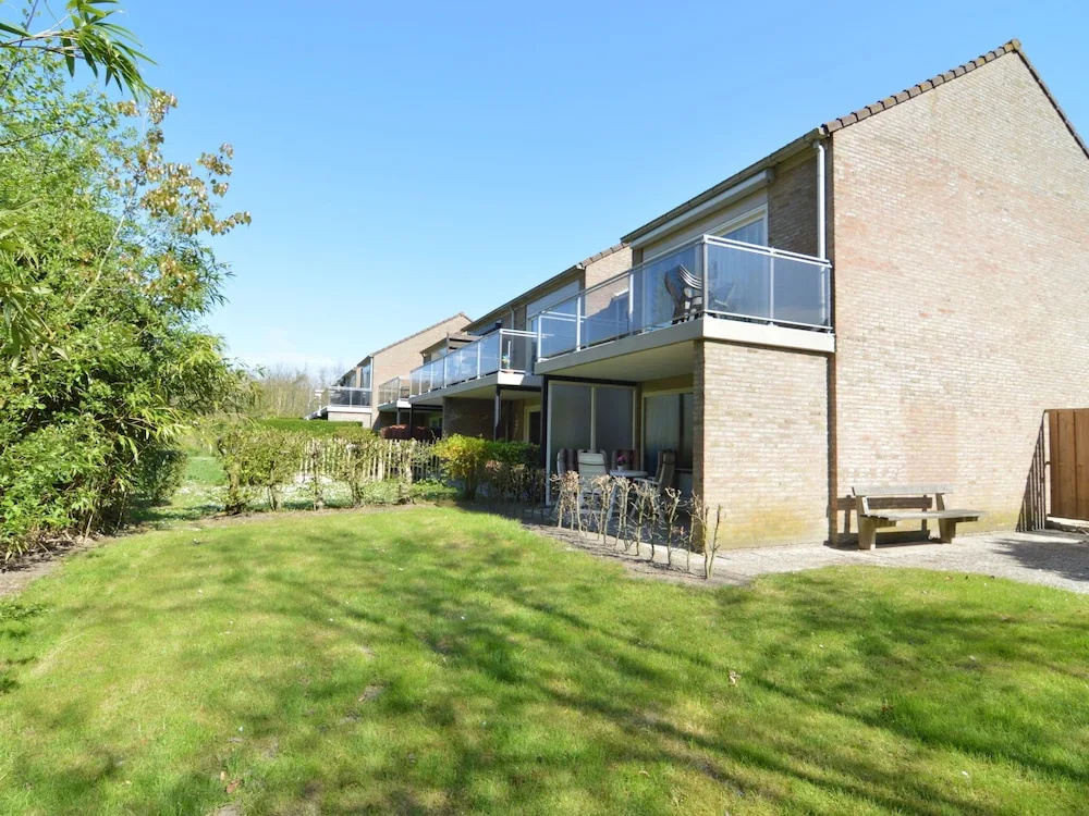 Apartment in Nieuwvliet with Roof Terrace, Garden, Parking