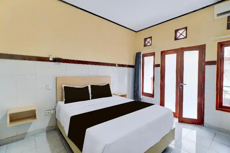 Sayang Maha Mertha Hotel - Chambres