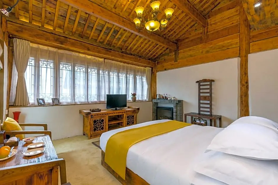Lijiang E-Outfitting Boutique Hotel - Chambres