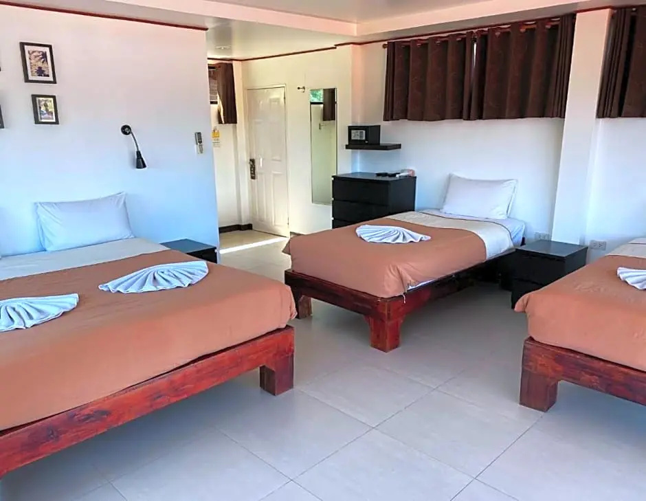The Reef Hotel & Studios - Chambres