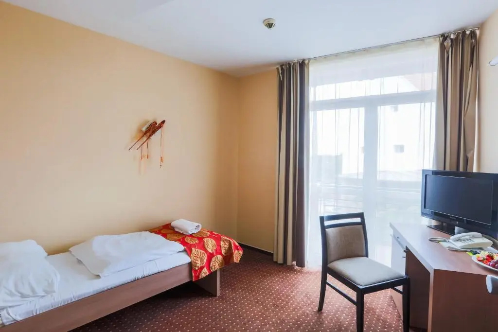 CE Plaza Hotel - Chambres