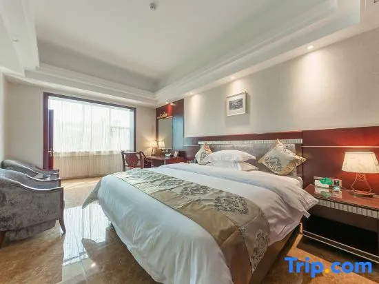 Yi Long Hotel - Chambres