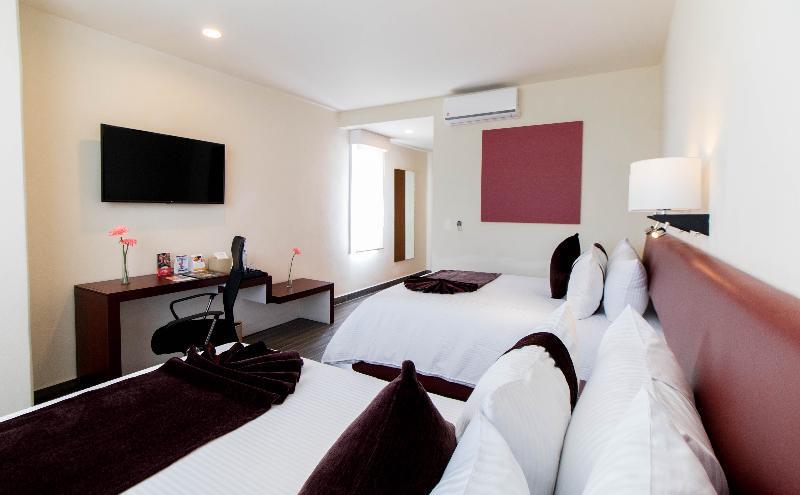 Двухместный номер Preferential 2 отдельные кровати в Hotel Misión Puebla Angelopolis