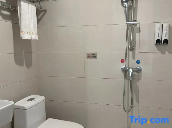 Huajun Hotel - Chambres