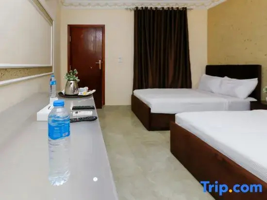 Standard Triple room with garden view