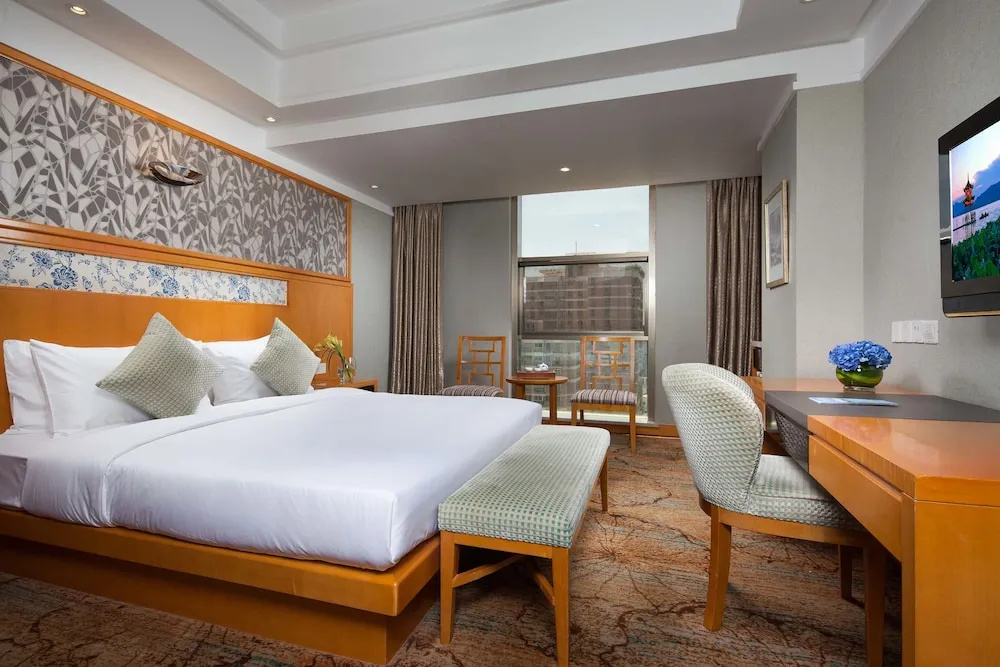 Huachen International Hotel - Chambres