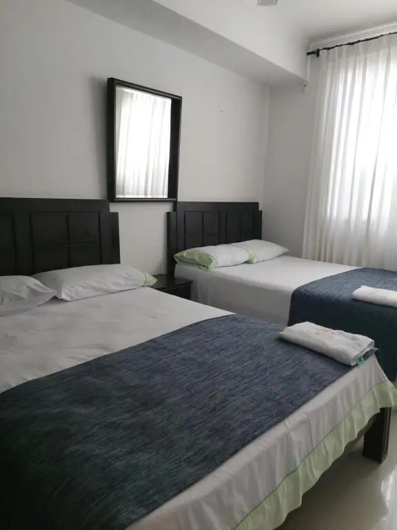 Casa Hotel Miriam - Chambres