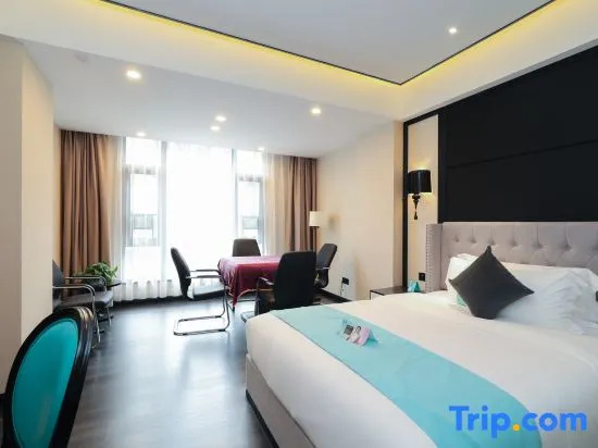Xinliyuan Hotel - Chambres