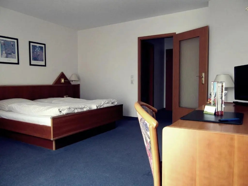 Atrium Hotel - Chambres