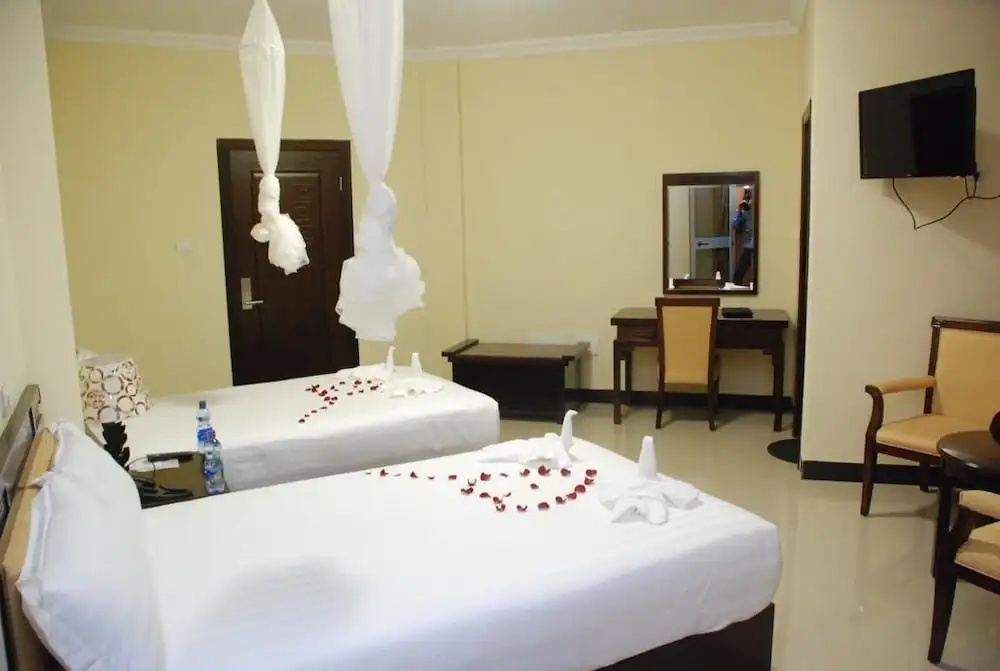 Asinuara Hotel - Chambres