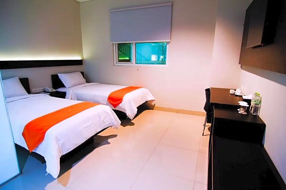 Alpha Hotel - Chambres