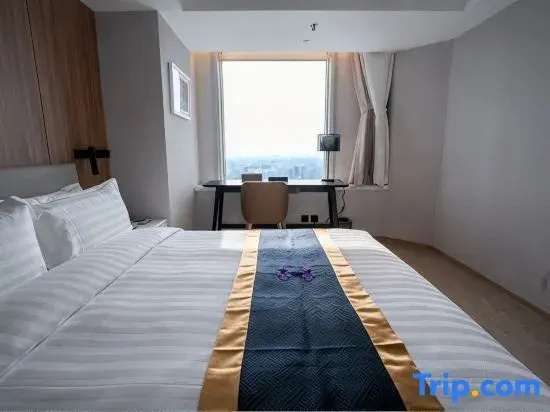 Jingguang Center Apartment Hotel - Chambres