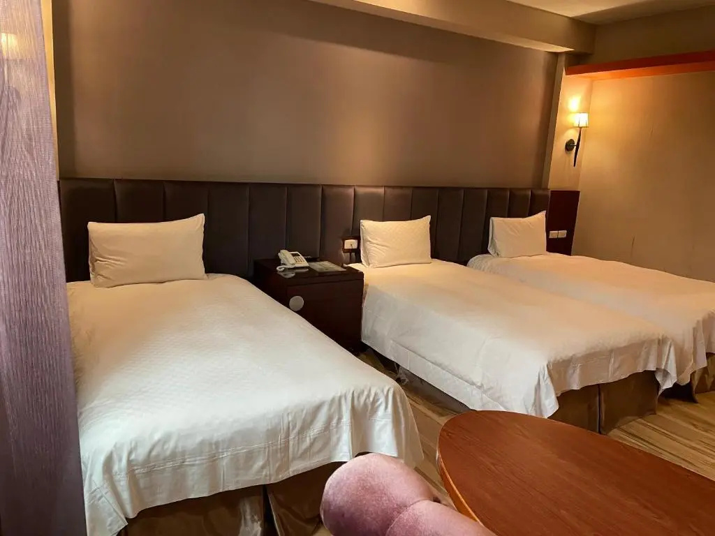 Chia Shih Pao Hotel - Chambres